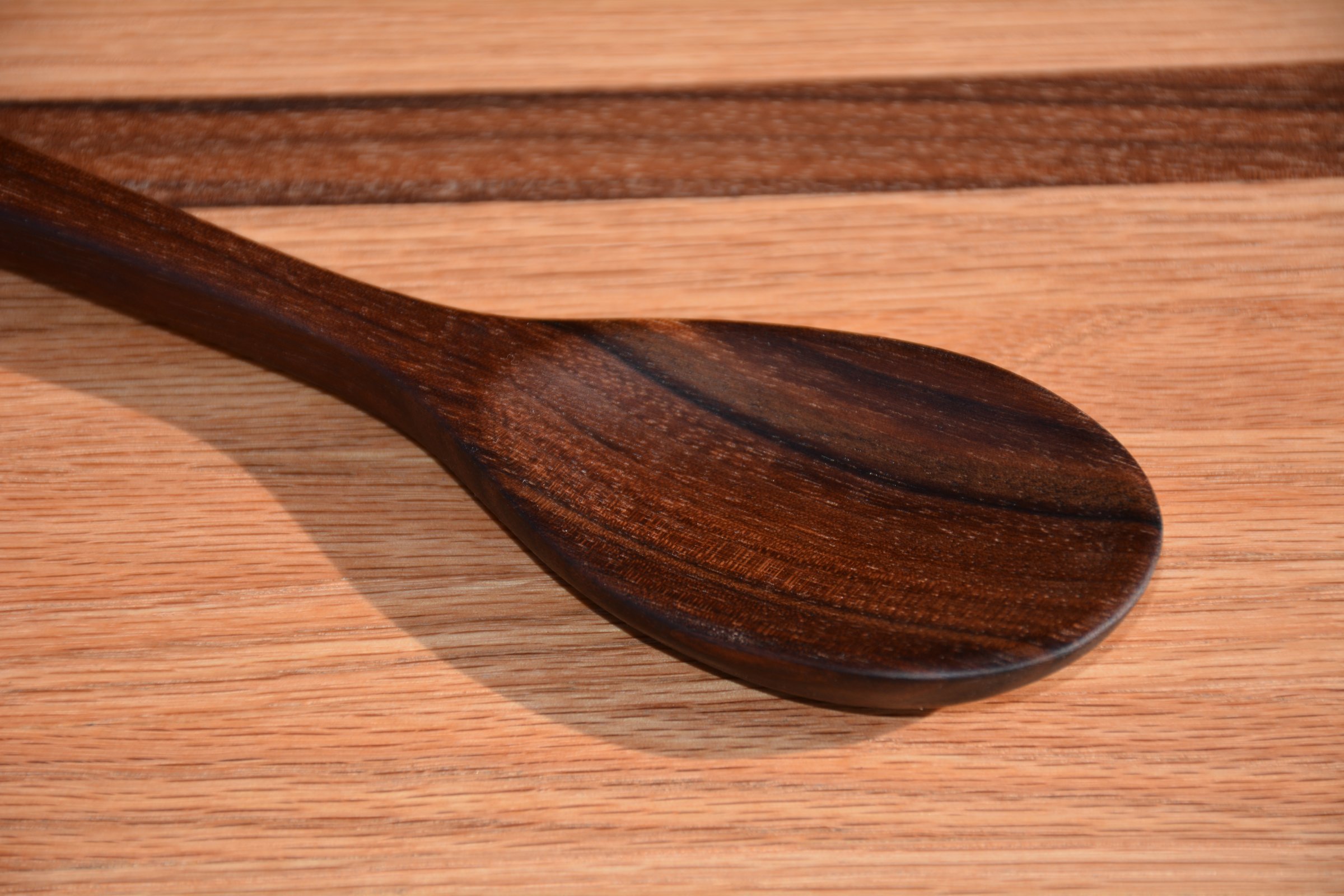 Hand curved wooden spoon